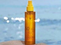 Upiększający olejek przeciwsłoneczny o wysokiej ochronie  SPF50